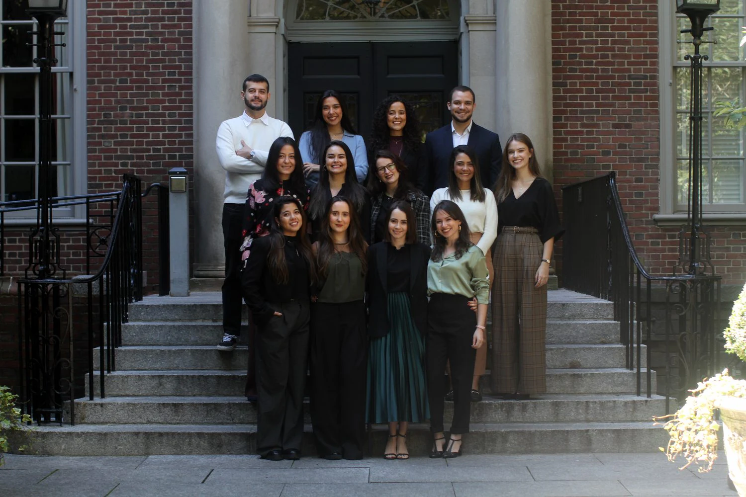 The 2024/2025 BLS Executive Board, standing together on the steps of a building entrance